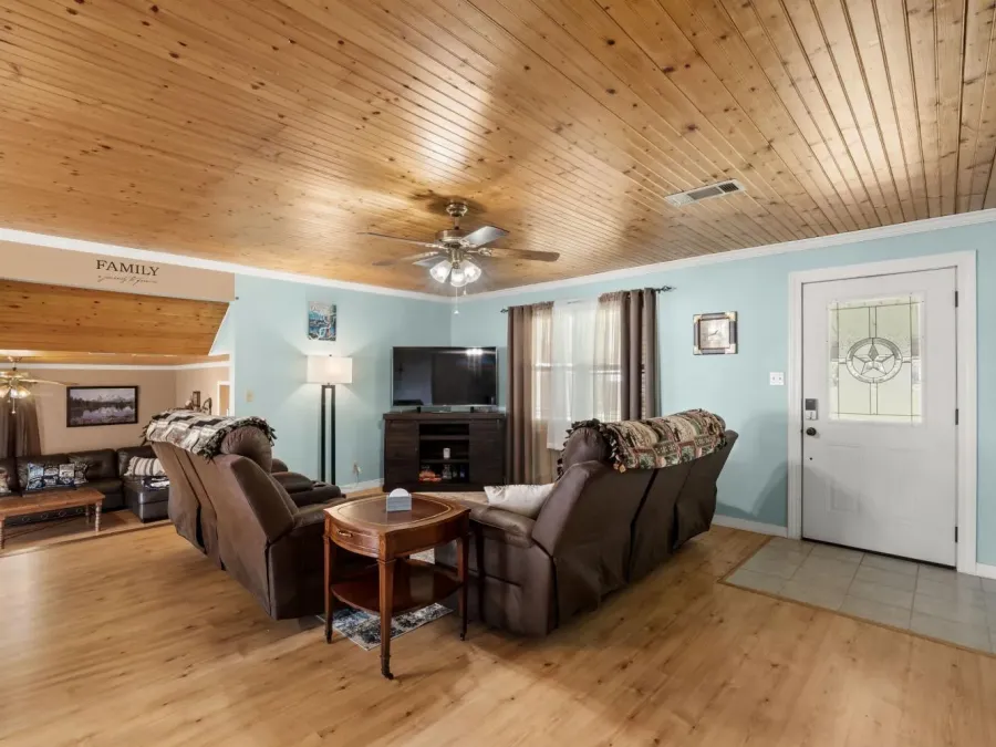 The living room has plenty of seating The living room has plenty of seating